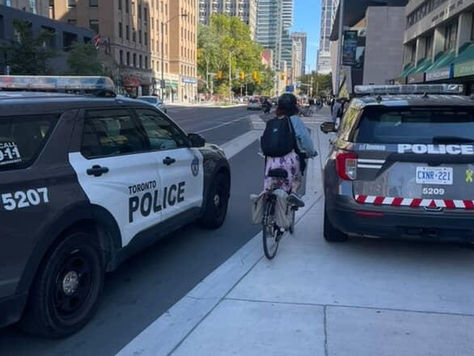 police parked in bike lane and on sidewalk