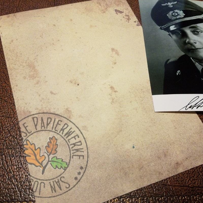 Thumbnail: Otto Carius - Back of Panzer Badge Award certificate (Panzerkampfabzeichen Urkunde) with signed photo
