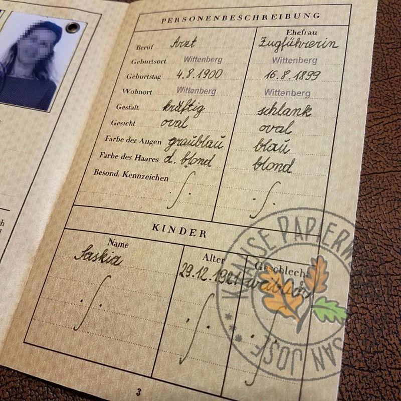 Thumbnail: Filled out reproduction of Third Reich Passport (Drittes Reich Reisepass). Married couple with a child. Third page.