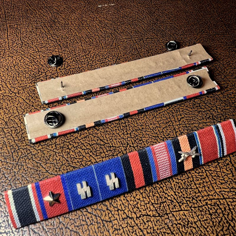 Thumbnail: Medal ribbon bar of Obergruppenführer John Smith from "The Man in the High Castle" - back mounting. Reproduction for sale.