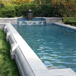 Custom luxury Backyard Environments Pool water fountain in Montecito