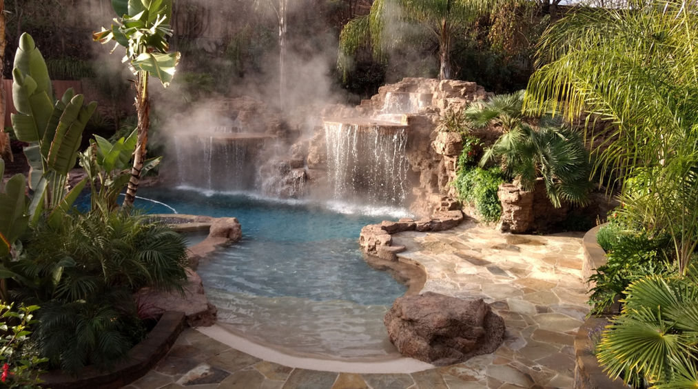 Custom rock waterfall in Pacific Palisades backyard pool