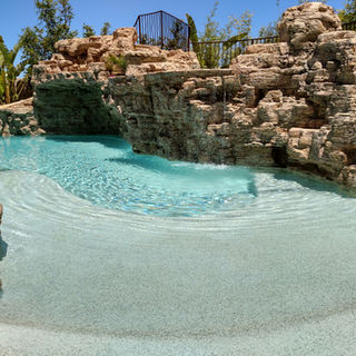 Custom luxury pool faux rock waterfall Pacific Palisades