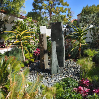 Custom luxury Backyard Environments Pool water fountain in Camarillo