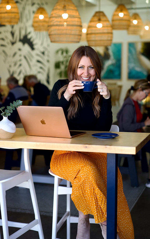 Kari Sorensen drinking coffee at Frontside Cafe Ventura CA Website Designer