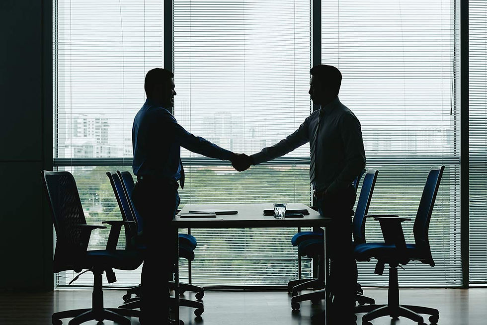 side-view-silhouettes-two-unrecognizable-men-shaking-hands-office-1200.jpg