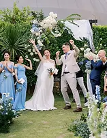 A joyful outdoor wedding ceremony filled with celebration, reflecting a seamless and wholehearted planning experience that made the day feel truly perfect and fulfilling.