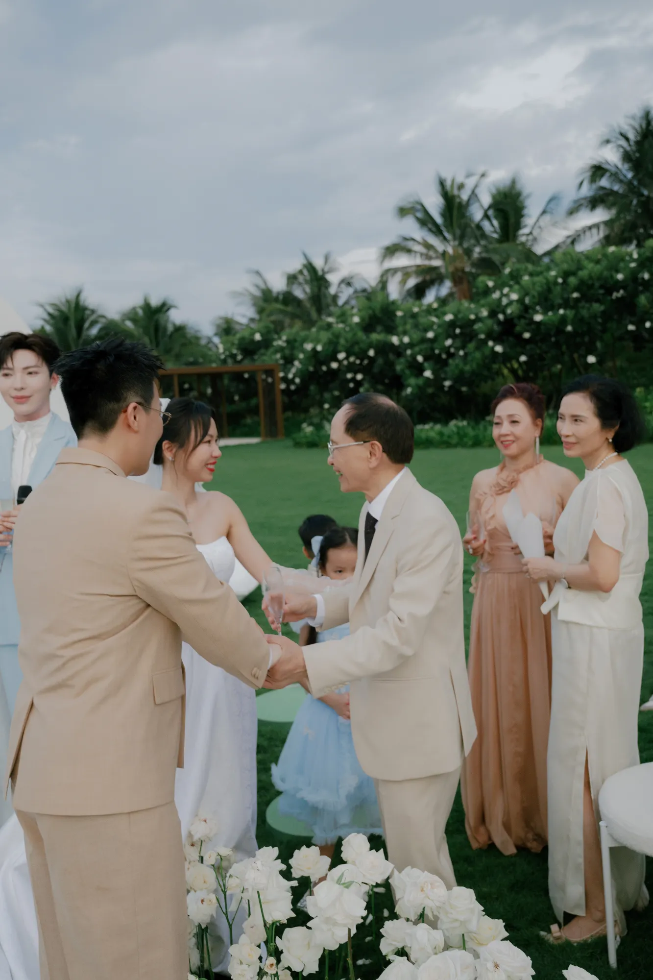 Parents congratulate the couple and share warm wishes.