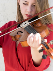 Free Photo _ Front view of violinist playing.png