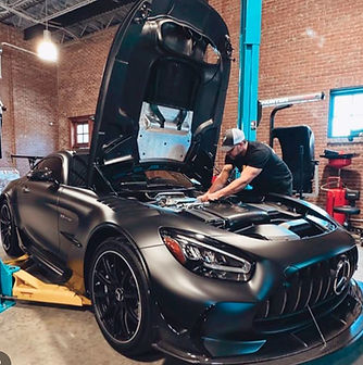 fabian working on black mercedes .JPEG