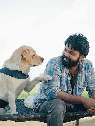 Rakshit Shetty and Charlie, the Labrador dog. in 777 Charlie