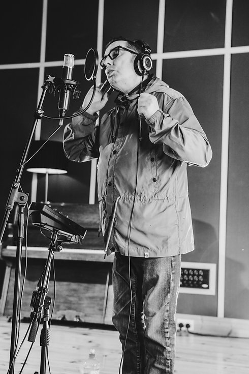 Christy 3 singing into mic.jpeg