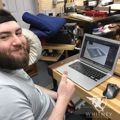 Harrison using Rhino 3D to model a telecaster bridge.