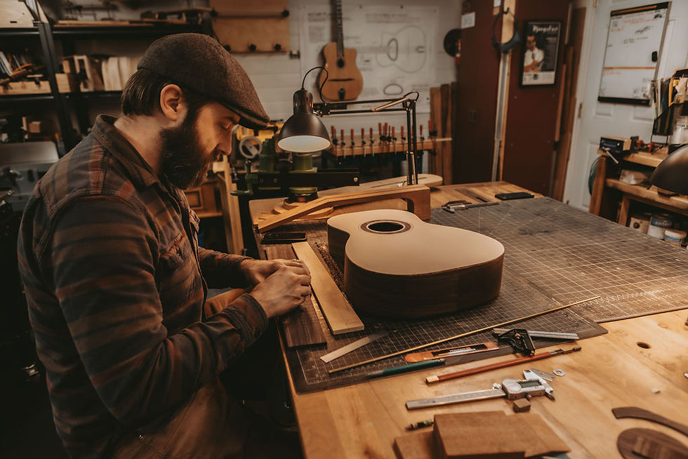 Student building an acoustic guitar during a 5-Week Acoustic Guitar Building Course at the Whitney School of Guitar Making.