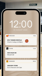 Phone screen showing a check-in reminder from Epic Themed Rentals for a Marvel-themed vacation rental in Amarillo, Texas, with a living room in the background.