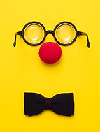 funny-glasses-a-red-clown-nose-and-tie-on-a-color-2022-05-24-08-12-59-utc_500.jpg