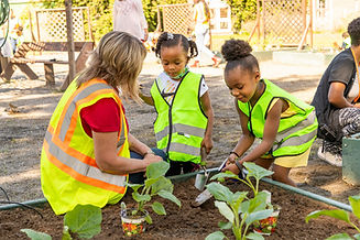 Volunteer gardening with children