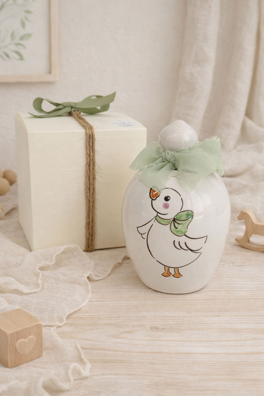 Bomboniera salvadanaio paperella verde   