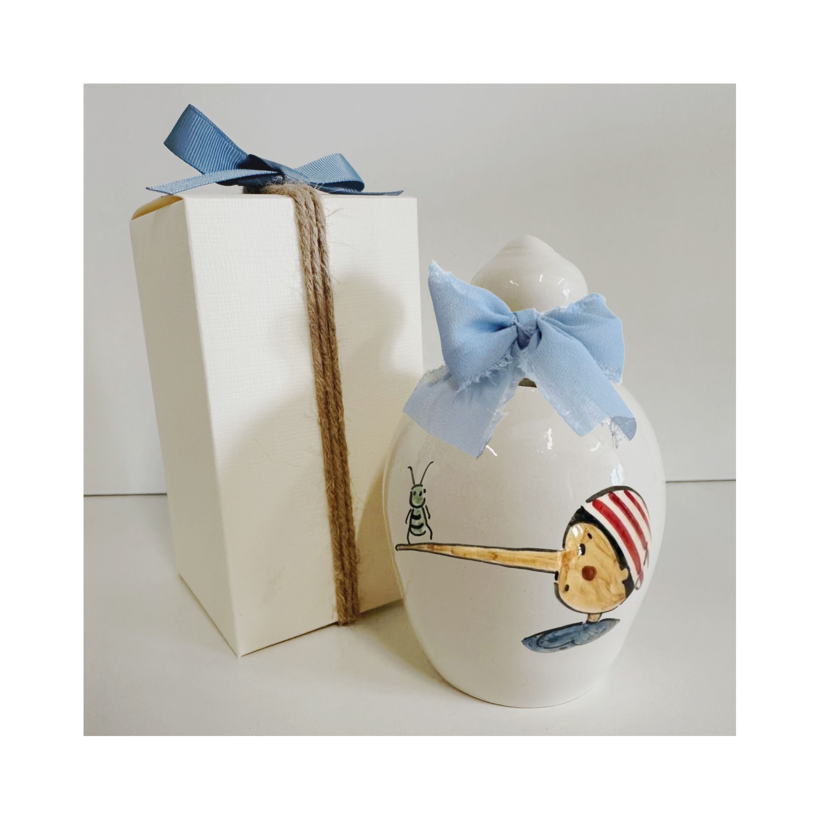 Bomboniera salvadanaio pinocchio 13cm