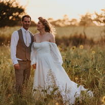 Romantic golden hour wedding portrait of a couple in Suffolk countryside, captured by wedding photographer Adam Prescott