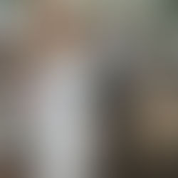 Bride and groom walking through biodegradable paper confetti