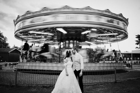 Editorial wedding photography of a couple on the vintage steam carousel at Bressingham Hall Norfolk