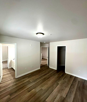 Professional vinyl flooring installation in Kirkland home with modern wood-look planks by Master Remodeling Pros.