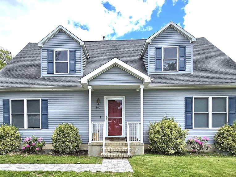 Gray two-story home, one of our sold properties.