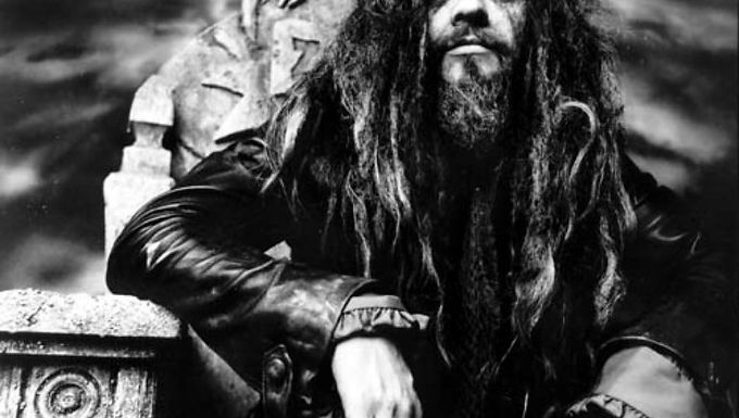 The horror genre embraces many forms of art, affecting their aesthetics, content, and representation. It tackles the themes of death, supernatural, ghosts, monsters, witchcraft, and generally everything dark and evil that can awaken the sense of fear. However, the influence of horror is controversial, as it can be repulsive and attractive at the same time. Due to its intensity, it can arouse a creative impulse, and its ambiguity can provide a great source of inspiration for many artists. Horror “reaches out with bloody, ichor-dripping tentacles to touch whatever it can get its fangs around. It loves to try new things, bring new genres into its web, and no form is spared. Music is no exception” (Ball, 2021, para. 2). Music has always been affected by the horror genre, even back to the medieval times, in the works of classical composers, and in the soundtracks for the first scary movies of the 20th century. However, heavy metal is the genre on which horror has had the greatest influence. Heavy metal and horror have coexisted and influenced each other for over half a century. According to Asbjørn Dyrendal, a professor of history and sociology, rock music began to evolve and manifest a heavier sound in the early 1970s, when the bands started to “look at horror films and the demonic as inspirational” for their music style, lyrics and aesthetics (Dyrendal, 2008, p.75). While the bands of the ‘60s and ‘70s, such as The Rolling Stones, The Beatles, Led Zeppelin played around the occult topics, rock music history unanimously agrees that Black Sabbath was the first band to really tap into the evil and horror, expressing it in every aspect of their work: their sound, texts, album covers, and overall style. The Birmingham quartet named themselves after the classic 1963 Mario Bava’s horror anthology (Hartmann, 2020, para. 2), and used sinister topics for their lyrics with vivid references to the occult, Lucifer, and Dennis Wheatley’s horror fiction. In an attempt to go against the mainstream music scene and create something new and exciting they used the Devil’s interval for their guitar riffs. Also known as Diabolus in Musica, a triton – is a chord that provides a disharmonious and eerie sound due to its dissonant intervals. Over the decades “countless bands including Judas Priest, Metallica, Slayer, Marilyn Manson and Slipknot have all relied on the devil’s interval to add darkness and power to their music” (Wiederhorn, 2022, para. 5). Black Sabbath changed the course of music history as, due to their work, the horror genre has firmly merged with heavy metal. The ‘70s era produced more artists who found inspiration for their music in horror. While the sound and the lyrics of KISS and Alice Cooper were not as dark, their performances appeared “far more theatrical” than Sabbath’s (Beezer, 2020, para. 5). KISS introduced to the audience provocative clothes and make-up, while personifying demons and spitting blood and fire on stage. Although, Alice Cooper is the one who is frequently referred to as the godfather of shock rock. He is known for his macabre shows, which include staged tortures and executions by electric chair, guillotine and gallows, chopping up baby dolls, pyrotechnics, giant snakes, and theatrical make-up (Gagne, 2022). Cooper popularised dreadful and terrifying imagery in heavy music, making his “carnival-of-terror live show” just as entertaining and trilling as horror movies (Beezer, 2020, para. 8). First shock-rockers laid a path for the musicians of the following decades who made a purpose for their music to scare the listeners. Their performances on stage were theatrical and frightening, while the texts of their songs revealed disturbing topics. Rammstein’s lyrics include the themes of various perversities, serial-killers, and psychopaths (Enis, 2022). Marilyn Manson had borrowed a part of his stage name from Charles Manson and invented a whole new horror-persona with an eccentric appearance. Rob Zombie is known for his love for the monsters, like Frankenstein, whose imagery he uses on the stage. Additionally, Zombie is recognised for the horror movies that he directed himself, like House of the 1000 corpses (2003) and Halloween (2007). At this point, with more bands creating creepy music videos or even writing soundtracks for the movies like The Crow (1994) or Bride of Chucky (1998) the metal scene and the horror cinema rose in mutual harmony. In the ‘80s and ‘90s rock and metal album covers became very much like horror movies posters, as the art intended to reflect the mood of the music and “to create an aura of fear and terror” (DiVita, 2022, para. 2). The direction of the genre was turning to the extremes and trash, death, and black metal bands were striving for faster, louder, and more aggressive sound. Their names also tended to represent the edge of the genre, such as Slayer, Venom, Death, Mayhem, and many others, recalling violent, frightening or demonic motifs. Aesthetics, sound, and performances of the metal bands “have always been influenced by horror movies”, their major themes and imagery (Zombie, D’Onofrio, 2017, para. 11). However, not all of the rock and metal bands who were influenced by the visual elements of the horror genre developed the same way of expressing it, being as gore and repulsive as possible. Besides cinema, many musicians found inspiration in horror literature, implementing some themes from it in their work. For instance, Anthrax’s Among the Living and Metallica’s Ride the Lightning are based on Stephen King novels. Iron Maiden’s Murders in the Rue Morgue is a clear reference to the Edgar Allan Poe’s short story. Metallica’s Call of the Ktulu and Black Sabbath’s Behind the Wall of Sleep are inspired by H.P. Lovecraft’s work. Fantasy, gothic and even classic literature overall finds a wide representation in heavy metal songs. Naturally, many musicians used to find inspiration in Biblical texts, and mentioning Satan and Luciferian imagery was very much in trend, as it has always been a frightening theme and a taboo in religious societies. Since Black Sabbath’s first references to the Devil, many rock and metal bands have developed this topic in their lyrics. A modern-day band Ghost can be seen as a fascinating example of how the “satanic” can shape the main concept of the band, with the prevalence of the content over the edgy sound. While the front-man of Ghost appears on stage as a Christian Pope with a demonic make-up, their lyrics mainly focus on praising Lucifer. However, musically, they do not rely on an extremely heavy or aggressive sound, as it is very diverse and they characterise themselves as “an occult, pop, satanic sort of rock ’n’ roll band” (Forge, Appleford, 2022, para. 11). Even though back in the ‘70s and ‘80s “metalheads such as Iron Maiden, Judas Priest, Alice Cooper and Mötley Crüe” were blamed for contributing to “what the American media called ‘The Satanic Panic,’ hardly any of these groups actually believed what they were singing about” (Watson, 2016, para. 6). From this point of view, horror themes  function purely as a rich source of inspiration for creative musical acts. Horror genre has had a great influence on heavy metal in its development. Music can be a very visual form of art, finding expression in the stage performances, videos, or album covers, and many bands scooped ideas from the horror movies and their imagery. Literature and horror fiction have an equally significant impact on the content and the lyrics of many musicians. The similarities between horror and heavy metal lie in a dark essence and a purpose to frighten and inspire at the same time. Kirk Hammett, a guitarist of Metallica and a profound admirer of the horror genre, says that he has always strived to create music that would confront the frightening subjects or “that most people feel aren’t appropriate to confront” (Hammett, Almond, 2017, para. 26). The horror genre does the same thing , as its power lies in ability “to shock and astound us, to defamiliarise us, to make us see the world anew” (Almond, 2017, para. 52). It becomes evident, then, that all forms of art are interlinked and that the genre of horror can be manifested and bring both joy and thrill equally through all of them.  Bibliographical References Almond, S. (2017, October 31). On horror, heavy metal, and why we love to be scared . Literary Hub . Retrieved December, 2, 2022, from https://lithub.com/on-horror-heavy-metal-and-why-we-love-to-be-scared/ Appleford, S. (2022, March 16). How ghost — 'an occult, pop, satanic sort of rock ’n' roll band' — conquered metal and the charts .  Los Angeles Times . Retrieved December 2, 2022, from https://www.latimes.com/entertainment-arts/music/story/2022-03-16/ghost-swedish-papa-emeritus-metal Ball, M. (2021, September 27). Horror is metal: Birmingham, Black Sabbath, and the birth of metal . Tor Nightfire. Retrieved December 2, 2022, from  https://tornightfire.com/horror-is-metal-birmingham-black-sabbath-and-the-birth-of-metal/ Beezer, T. (2020, October 31). The sinister urge: How the marriage of metal and horror terrified the world . uDiscover Music . Retrieved December 2, 2022, from https://www.udiscovermusic.com/in-depth-features/sinister-urge-marriage-metal-horror-terrified-world/ DiVita, J. (2022, October 24). The 31 scariest metal album covers all time .  Loudwire. Retrieved December 2, 2022, from  https://loudwire.com/scariest-metal-album-covers/ D'Onofrio, R. (2017, February 13 ). Rob zombie on heavy metal and horror movies . ComingSoon.net. Retrieved December 2, 2022, from https://www.comingsoon.net/horror/features/813713-interview-rob-zombie-on-heavy-metal-and-horror-movies#/slide/1 Dyrendal, A. (2008). Devilish Consumption: Popular Culture in Satanic Socialization. Numen, 55(1), 68–98. http://www.jstor.org/stable/27643294 Enis, E. (2022, August 19). Cannibalism, perversion, torture: 10 most shocking Rammstein lyrics . Revolver. Retrieved December 2, 2022, from  https://www.revolvermag.com/music/10-most-shocking-rammstein-lyrics#8-stein-um-stein-2004 Gagne, M. (2022, November 9). Rock rewind: Alice Cooper the godfather of shock rock . Rock 95. Retrieved December 2, 2022, from https://rock95.com/rock-rewind-alice-cooper-the-godfather-of-shock-rock/ Hartmann, G. (2020, March 5 ). The secret to metal is horror . Loudwire. Retrieved December 2, 2022, from  https://loudwire.com/the-secret-to-metal-is-horror/ Watson, T. (2016, October 31). The devil's chord: A history of satanism in popular music . Crack Magazine . Retrieved December 2, 2022, from https://crackmagazine.net/article/long-reads/what-is-satan-music/ Wiederhorn, J. (2022, August 9). The devil's tritone: The history of a most sinister chord. Fender Guitars | Electric, Acoustic & Bass Guitars, Amps, Pro Audio. Retrieved December 2, 2022, from  https://www.fender.com/articles/tech-talk/the-devils-chord-the-eerie-history-of-diabolus-in-musica Visual Sources Figure 1: Allen, B. (2015). Horror Movies and Heavy Metal Characters Design. [Illustration]. Retrieved from: https://www.flylanddesigns.com/horror-movie-and-heavy-metal-character-designs/  Figure 2: Alice Cooper on stage with his snake. (n.d.). [Photograph]. Retrieved from: https://www.stuff.co.nz/entertainment/music/119261928/alice-cooper-still-feels-like-a-teenager-when-performing-after-five-decades-on-stage  Figure 3: Scary heavy metal album covers. (n.d.). [Illustration]. Retrieved from: https://loudwire.com/scariest-metal-album-covers/  Figure 4: Ghost: Papa Emeritus III and the Nameless Ghouls. (n.d.). [Photograph]. Retrieved from: https://wall.alphacoders.com/by_sub_category.php?id=220495&name=Ghost+B.C.+Wallpapers