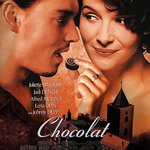 Chocolat film, man eating chocolate staring a women