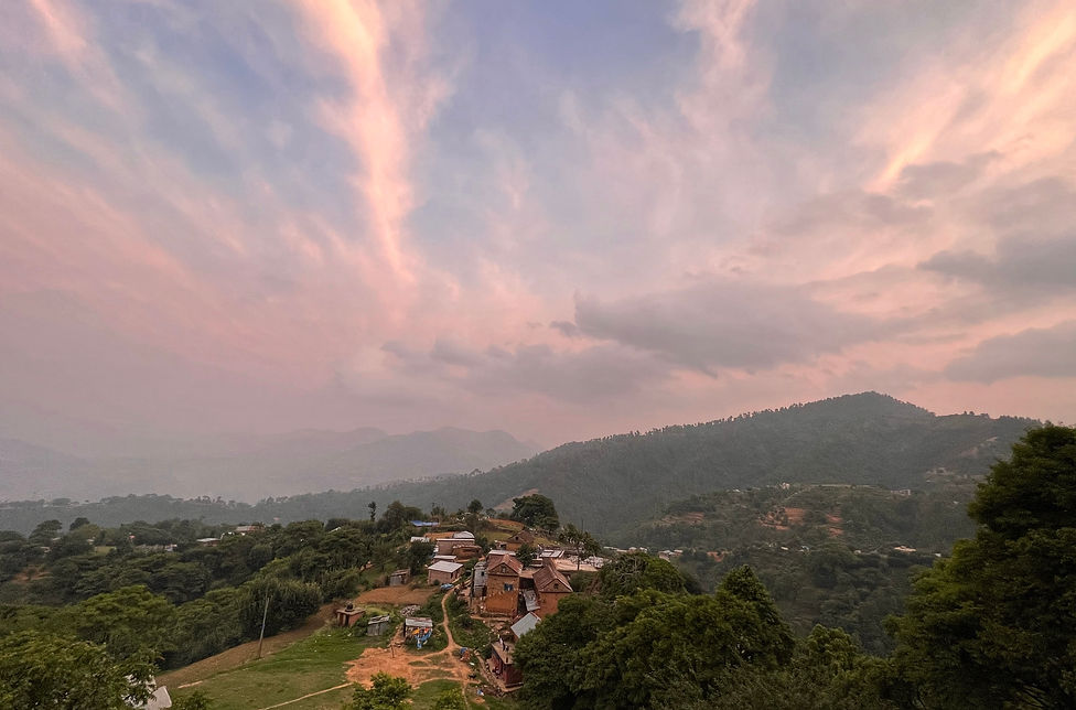 pink-sunset-panoraoma-over-village.jpg
