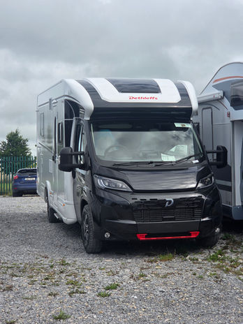 The Dethleffs Trend T7057 DBL is a luxury motorhome with a 140 bhp automatic gearbox on a Fiat Ducato chassis. It features a queen-size island bed, spacious lounge, and well-equipped kitchen. With ambient lighting, ample storage, and Truma heating, this stylish motorhome is perfect for family adventures. Built with Dethleffs famed quality touch.