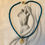 Thumbnail: Matte Deep Turquoise Love Bead Necklace with Love Forever Heart Charm