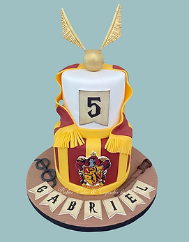 Harry Potter Cake with the golden Snitch, Want, glasses and Gryffindor Scarf.