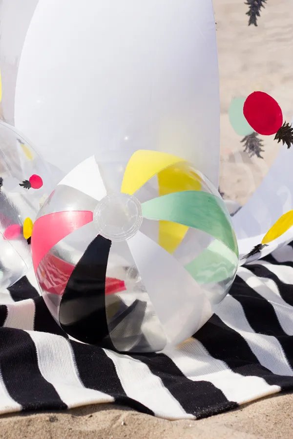 DIY-Painted-Stripe-Beach-Balls-600x900.jpg.webp