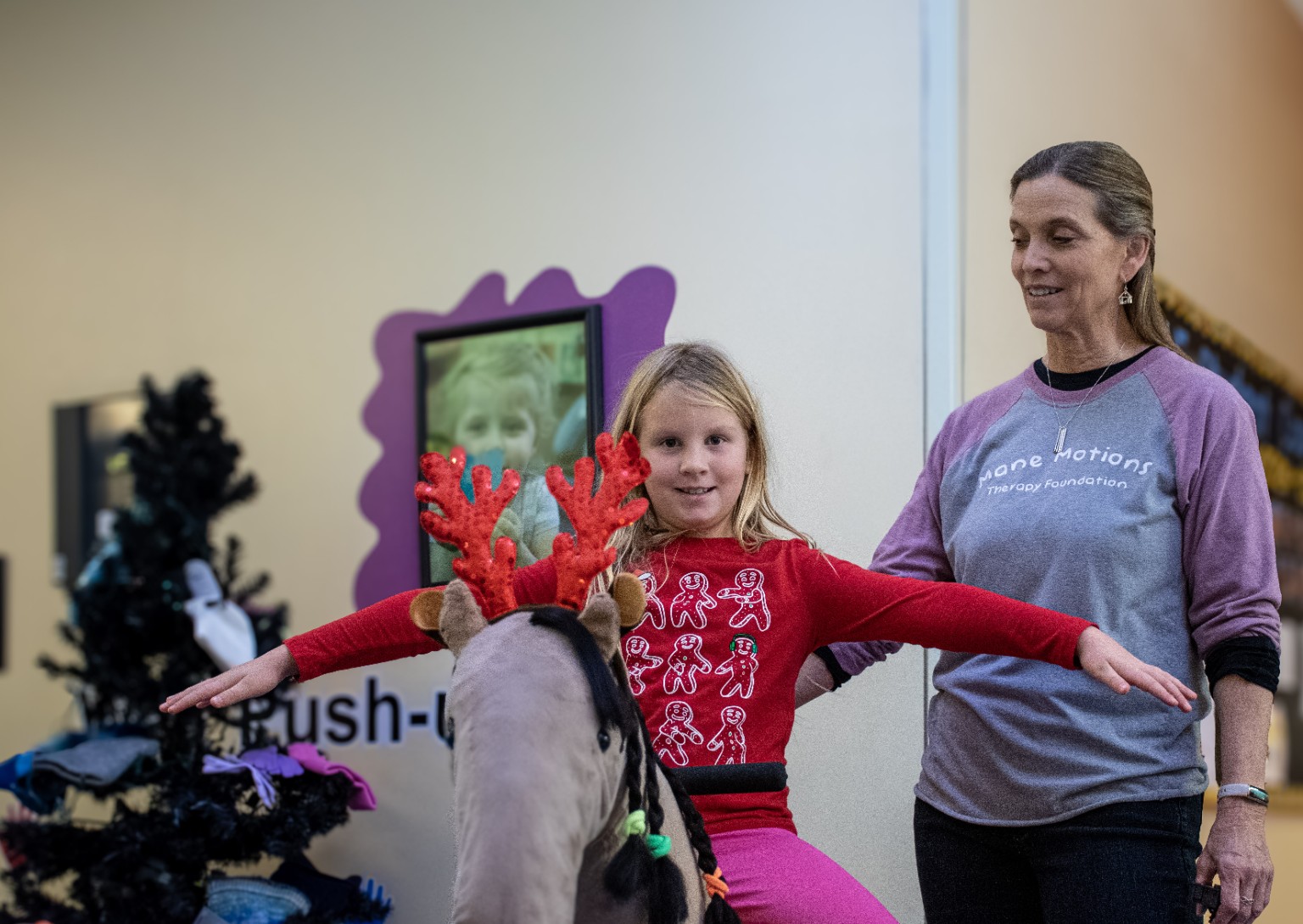 Child participating in a Mane Motions community activity