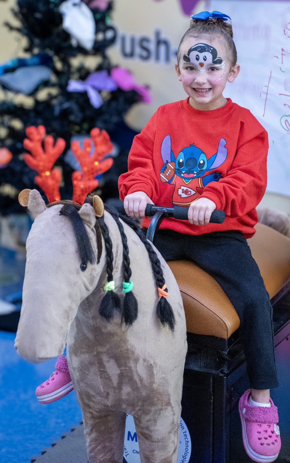 Young participant enjoying a Mane Motions event