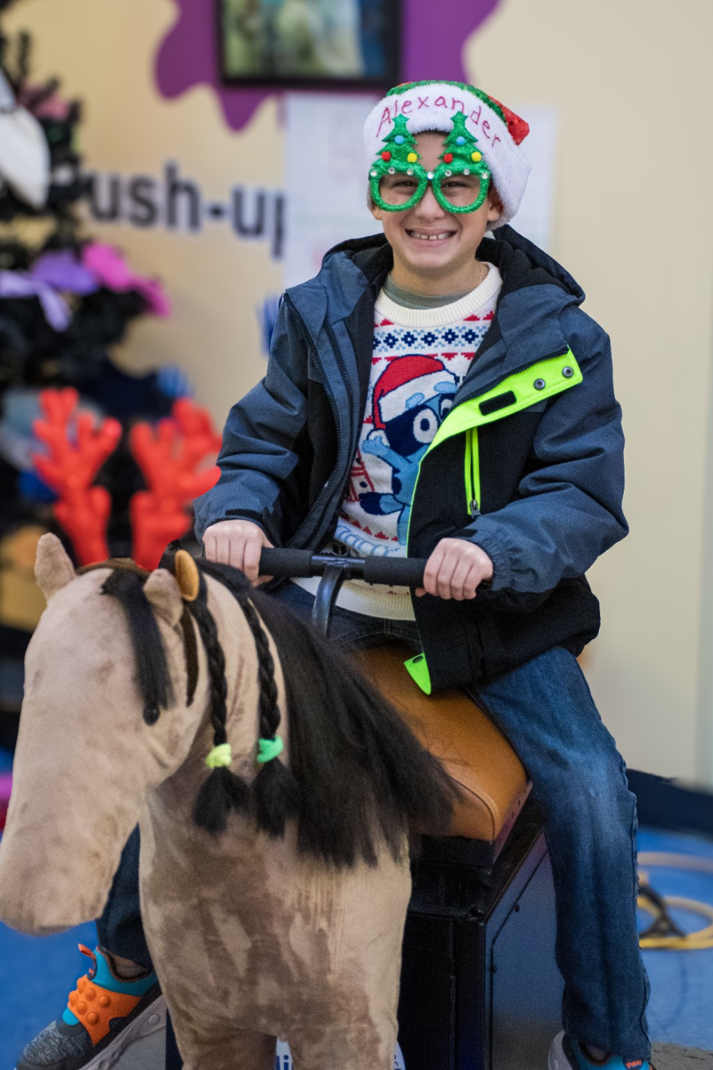Participant at a Mane Motions holiday community event