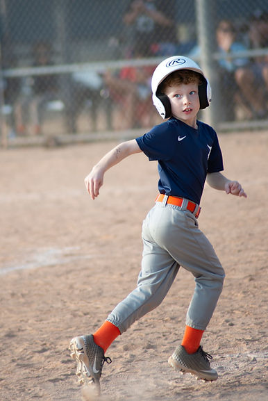 Young Basball Kid Running Bases