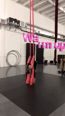 gymnastics warm up using silks.gif