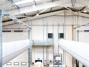 Architectural photograph of rooftop energy infrastructure on a commercial building