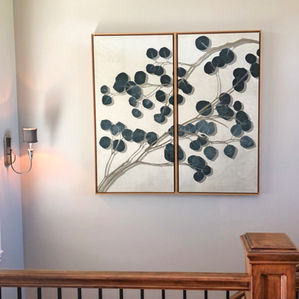 Ackerley Art installation of two paintings hung as diptych in large stairway.