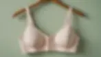 Close-up view of a post-surgery recovery bra on a hanger