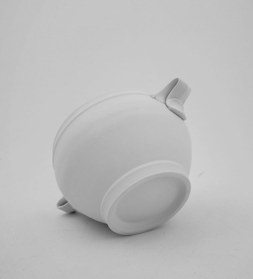 Thumbnail: A black and white photo of an unglazed stoneware grounds bowl's bottom.