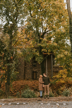 engaged couple posing for photo in Clippers Mill, Baltimore