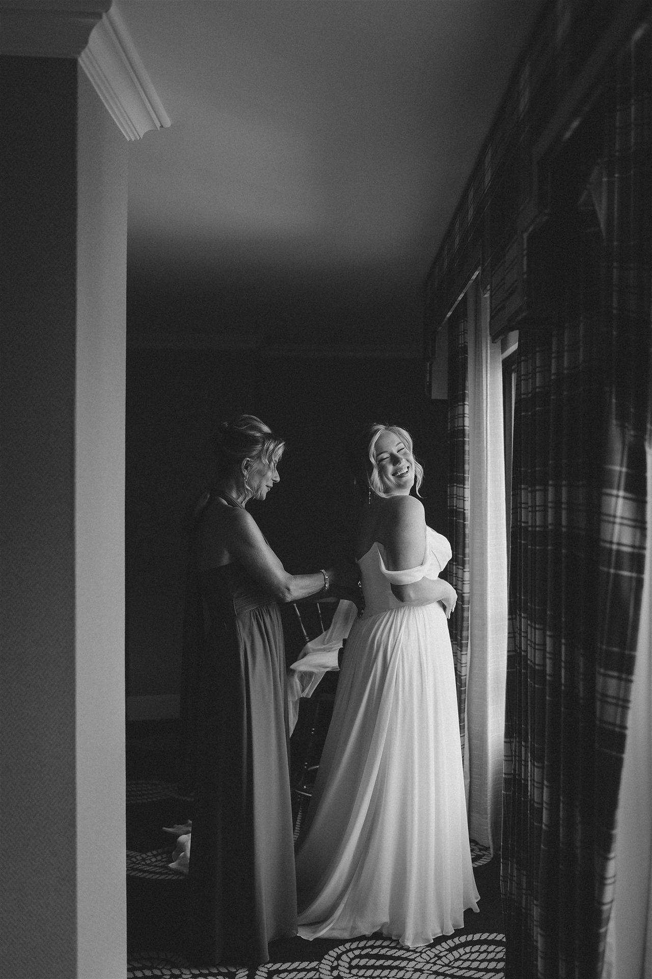 annapolis bride steps into her wedding dress at the Graduate Hotel Annapolis