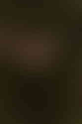 engaged man and woman holding hands