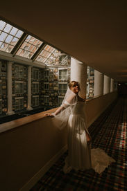 annapolis bride steps into the sun getting ready at the Graduate Hotel Annapolis