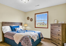 The Glenwood Senior Living Community. Photos of common areas such as theater, lobby, dining room, model bedroom.