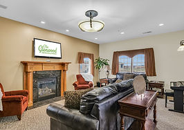 The Glenwood Senior Living Community. Photos of common areas such as theater, lobby, dining room, model bedroom.